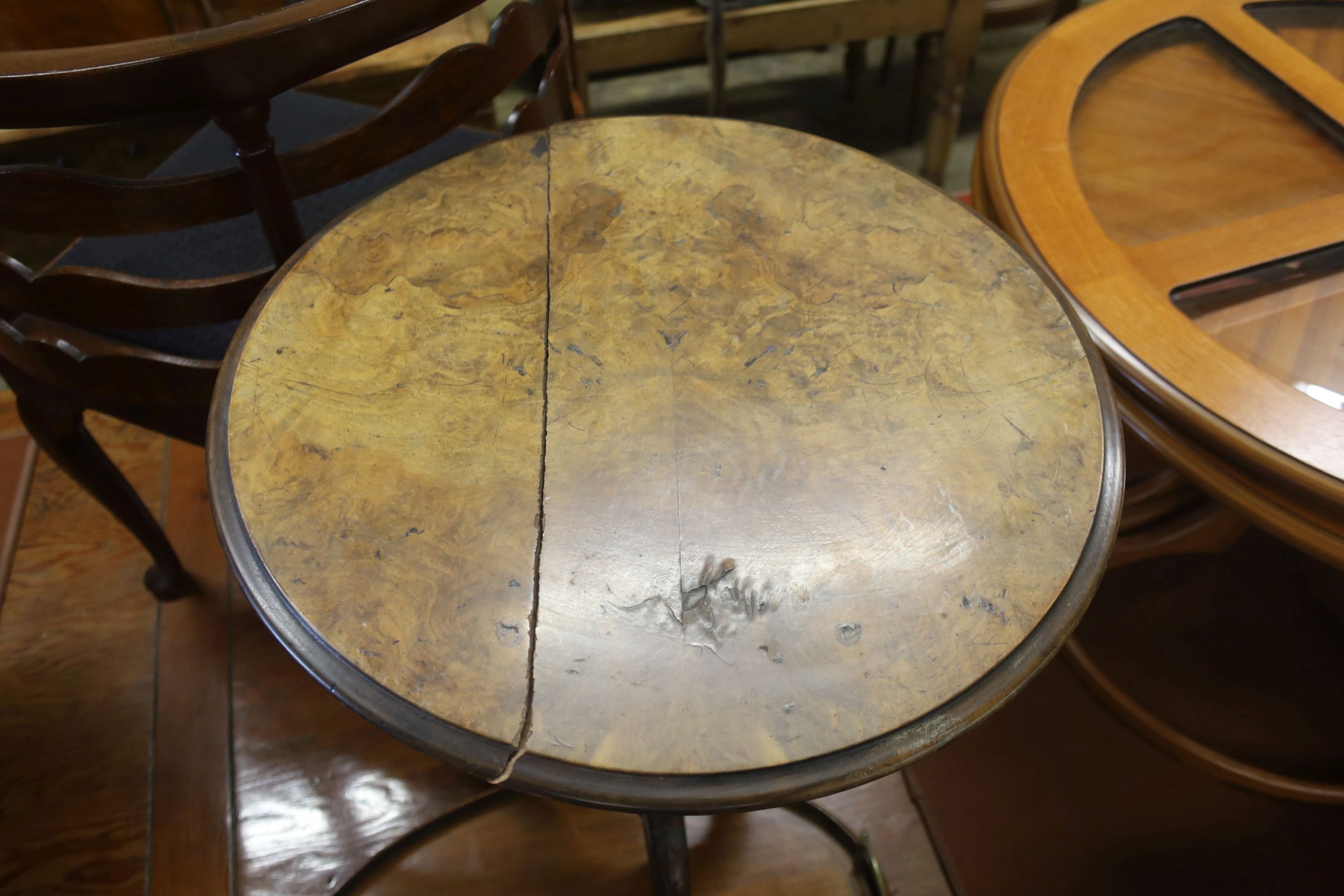 A Victorian walnut circular tripod table (a.f.) and an Edwardian inlaid oval tea tray